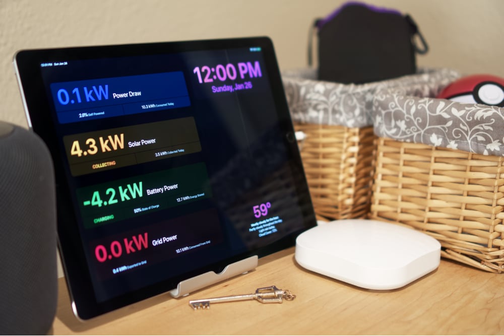 An iPad with a custom Solar Roof dashboard.